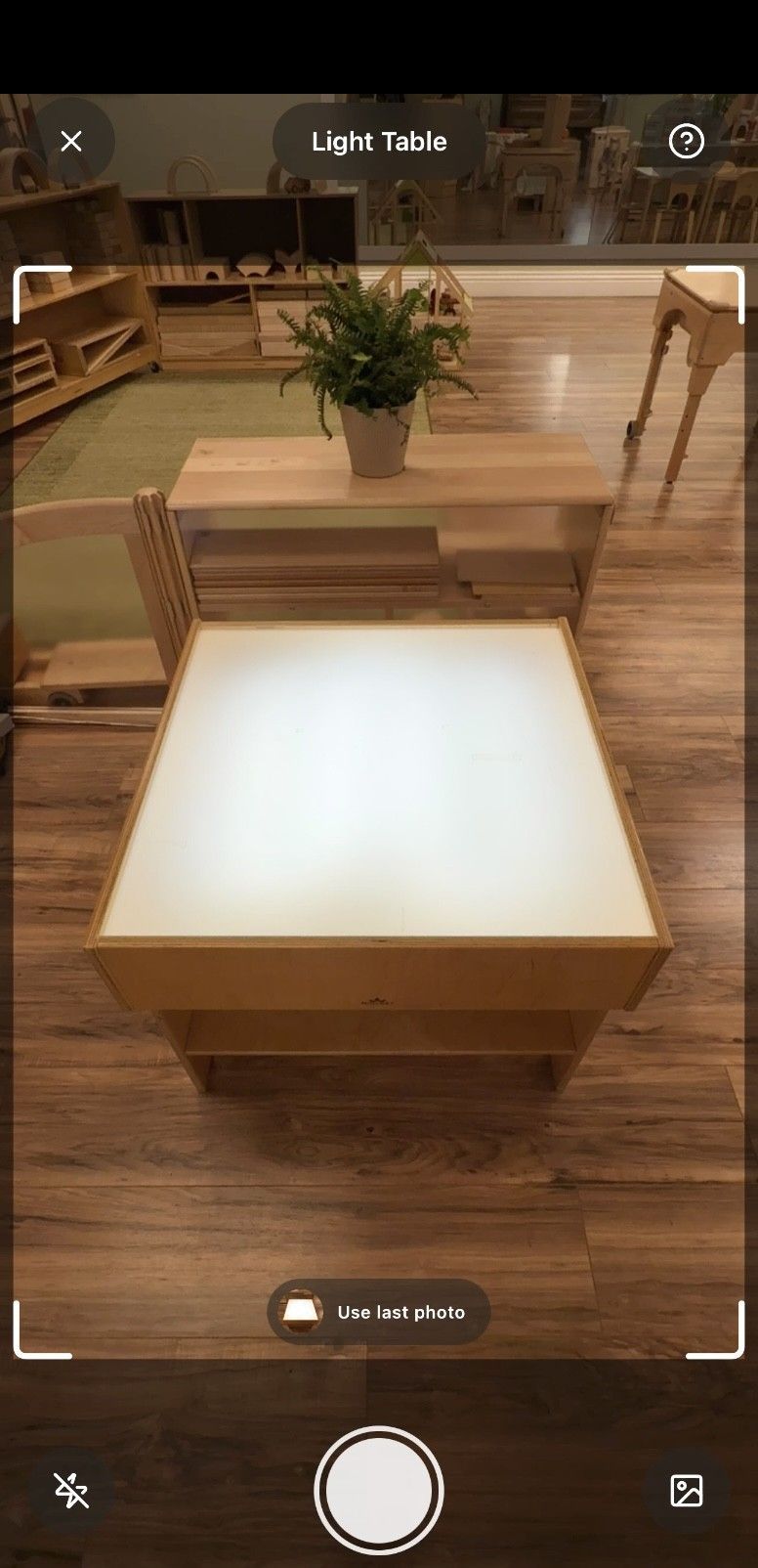 The Sparka camera screen framing a light table